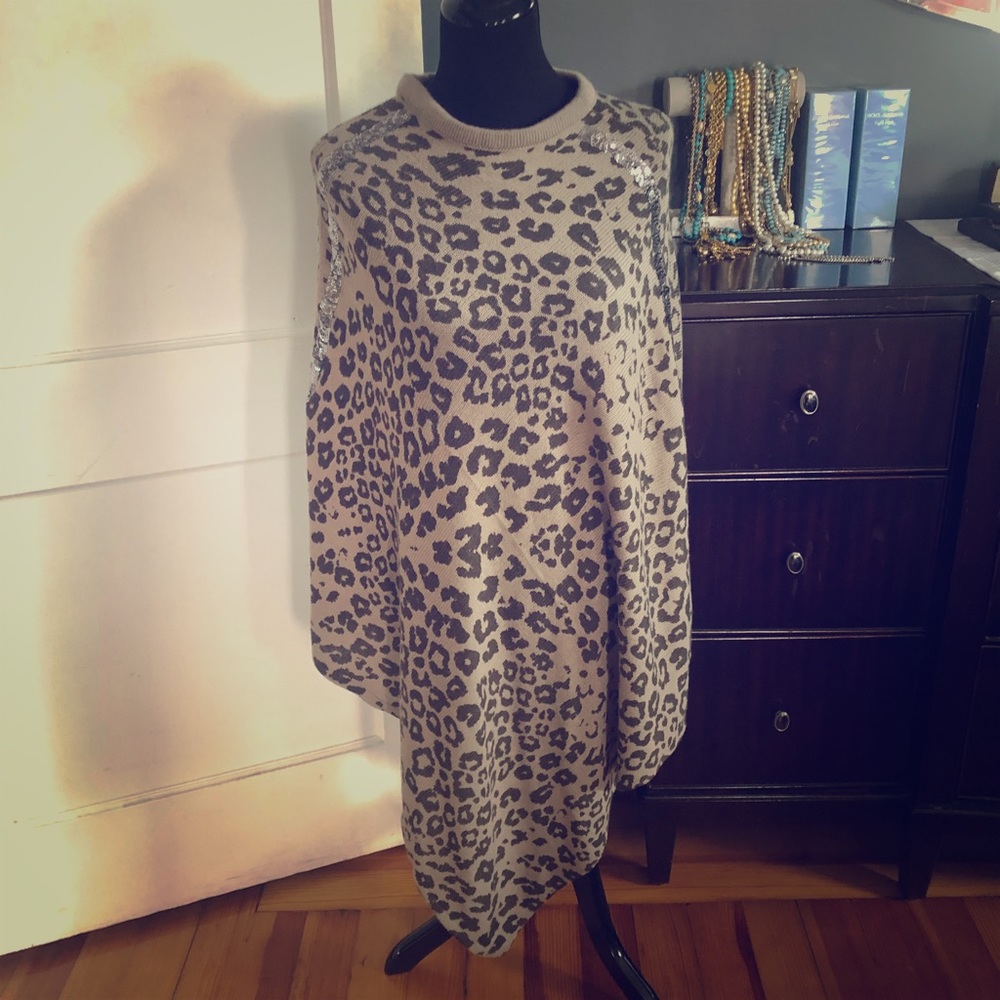 Leopard knit poncho.